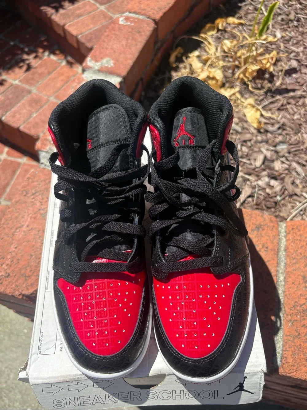 Jordan Retro 1 Mid Kids Black and Red Sneakers